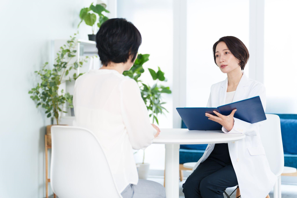 A woman receiving a medical examination at a gynecologist