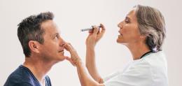 A patient receives an eye examination