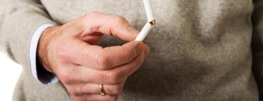 male-hand-with-broken-cigarette