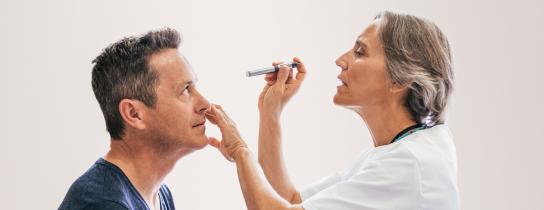 A patient receives an eye examination