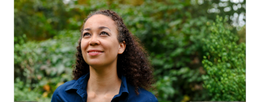 woman looking hopeful outdoors